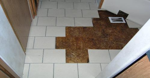 Old tile coming out